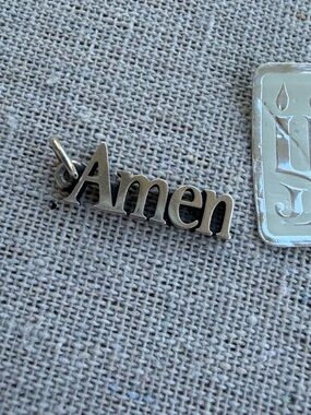 Retired Amen charm